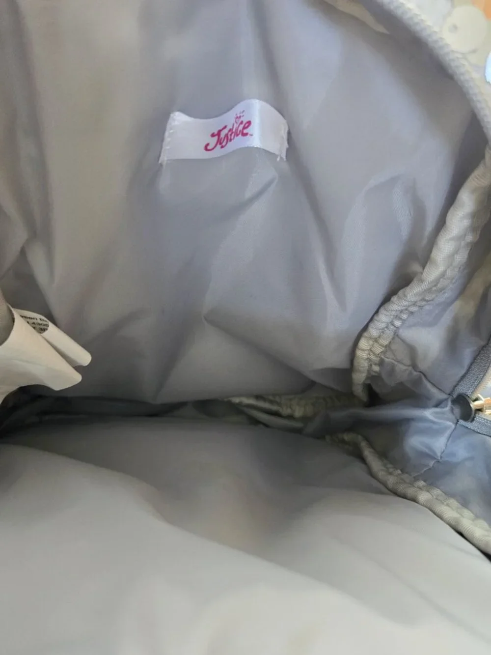 NWOT Justice girls' silver sequin and plush husky mini backpack w/ pompom